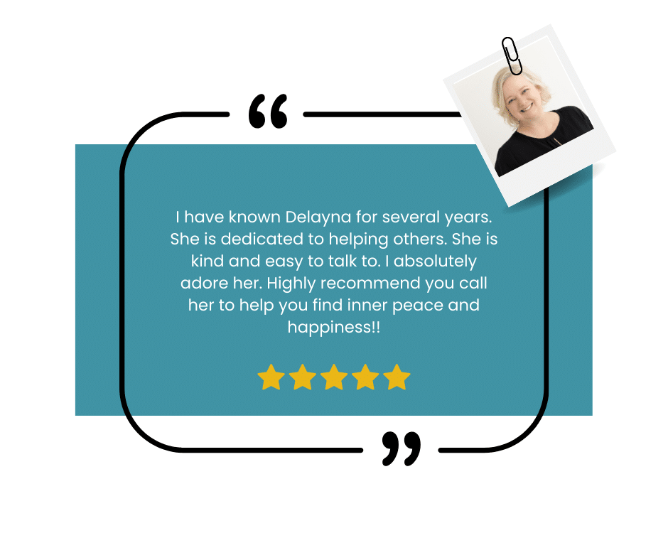 Person using laptop with smartwatch and rings.