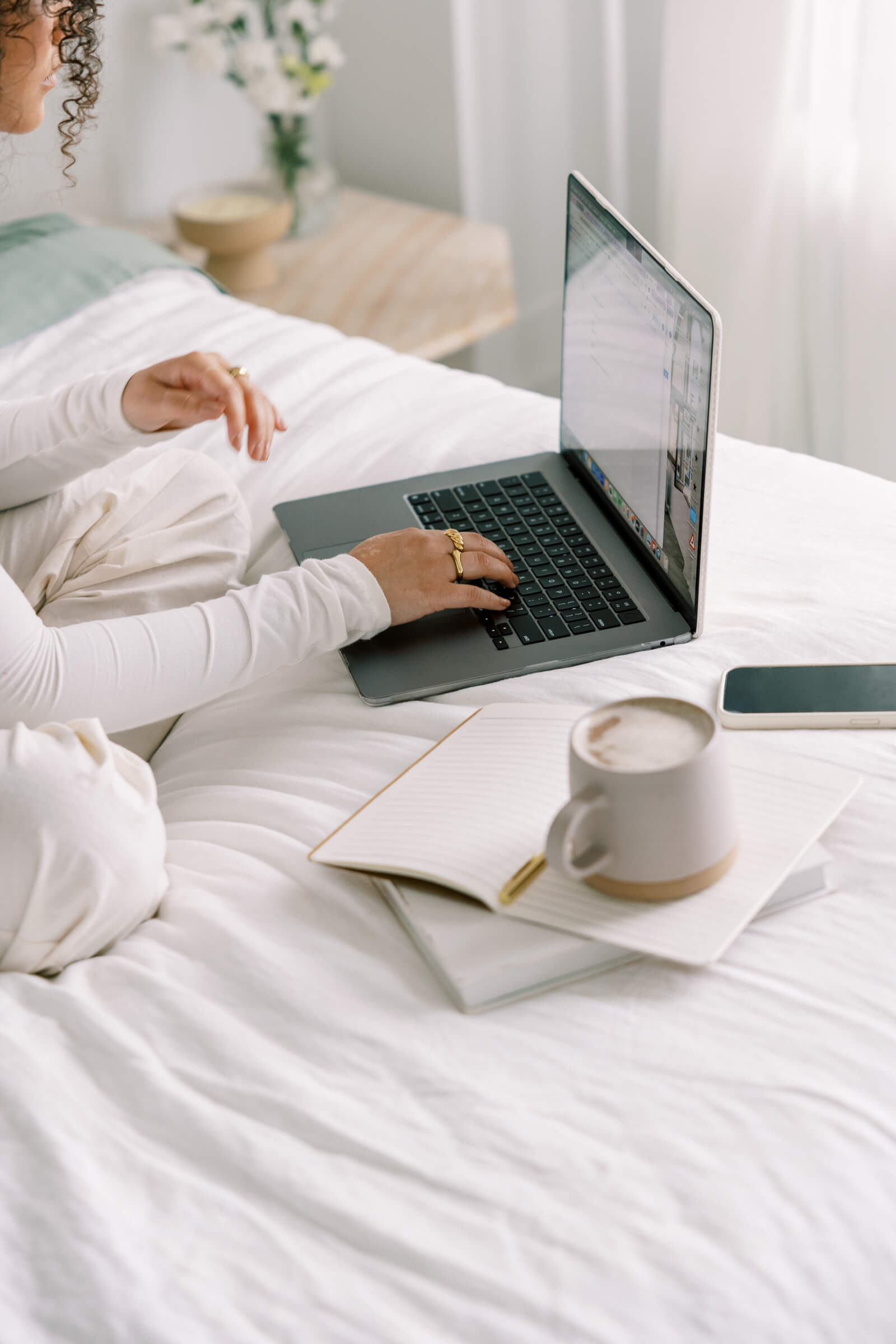 EMDR therapist reading about EMDR for autistic clients on a laptop.
