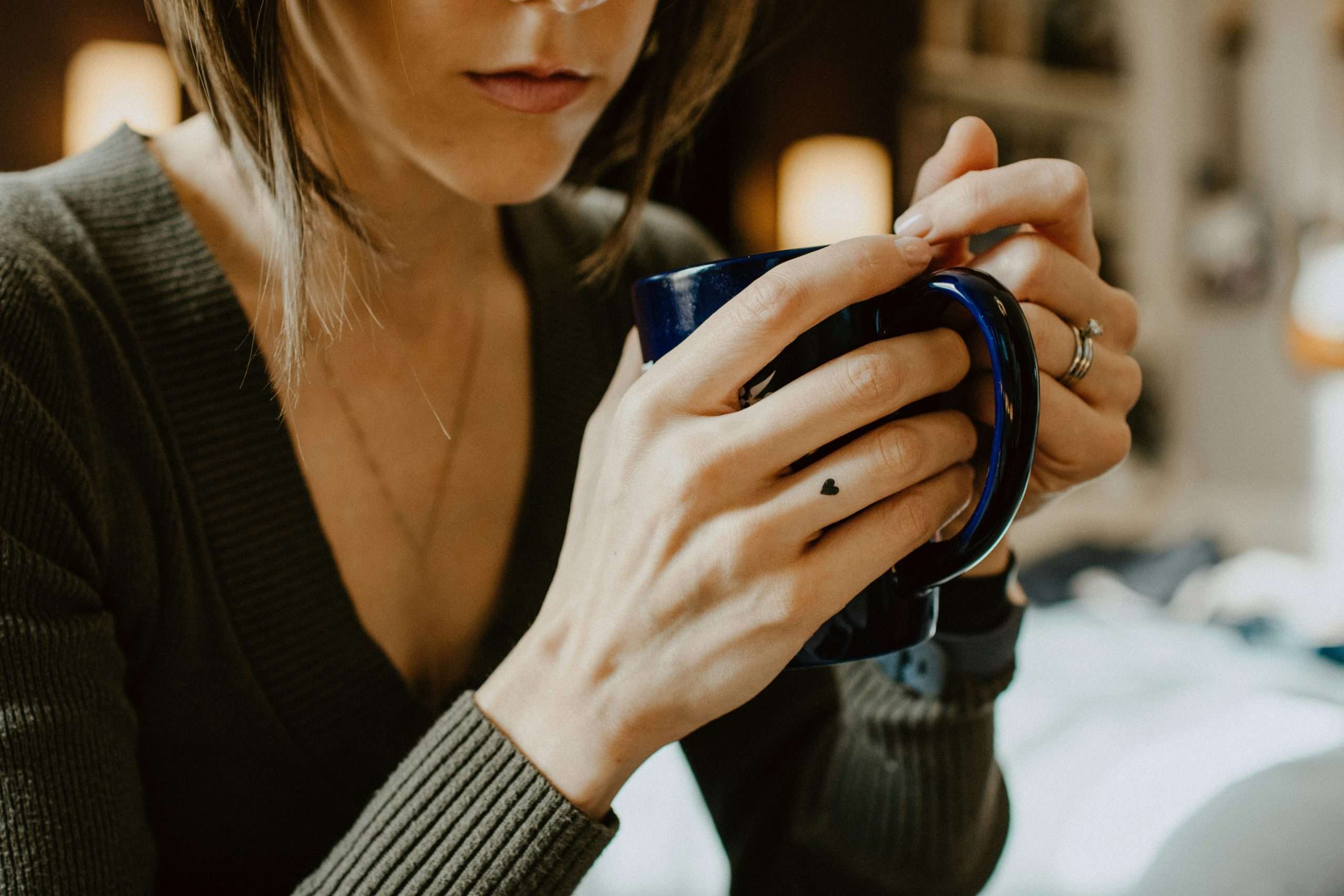 woman holding a mug