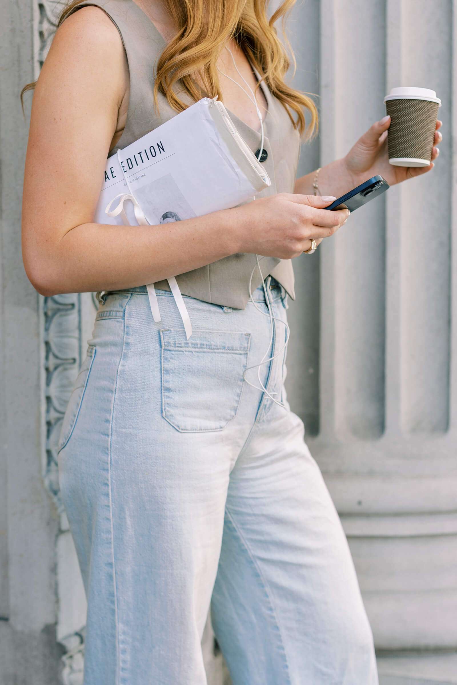 Woman searching her phone for EMDR therapy near me in St. George, UT